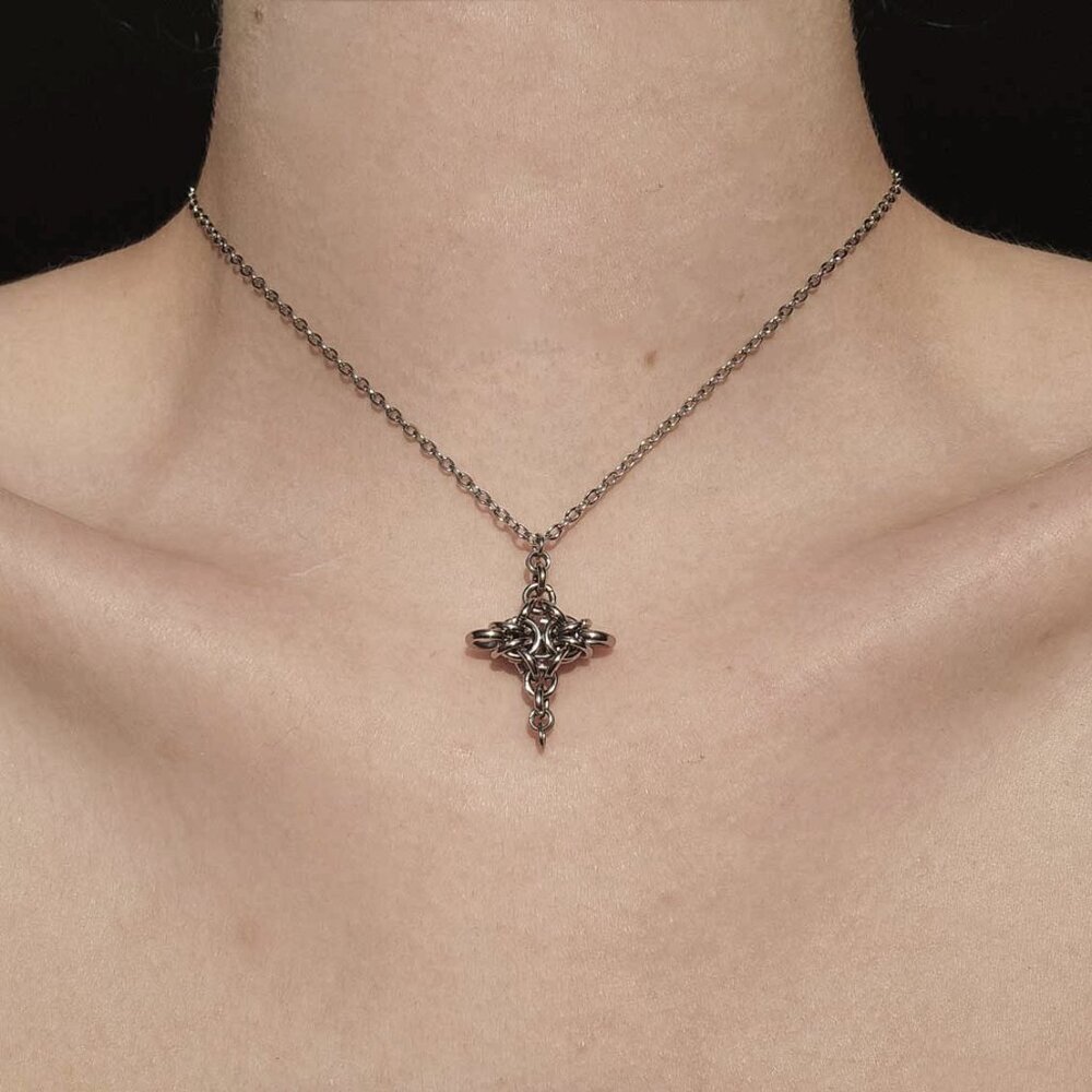 Gothic silver star necklace with a small silver chain